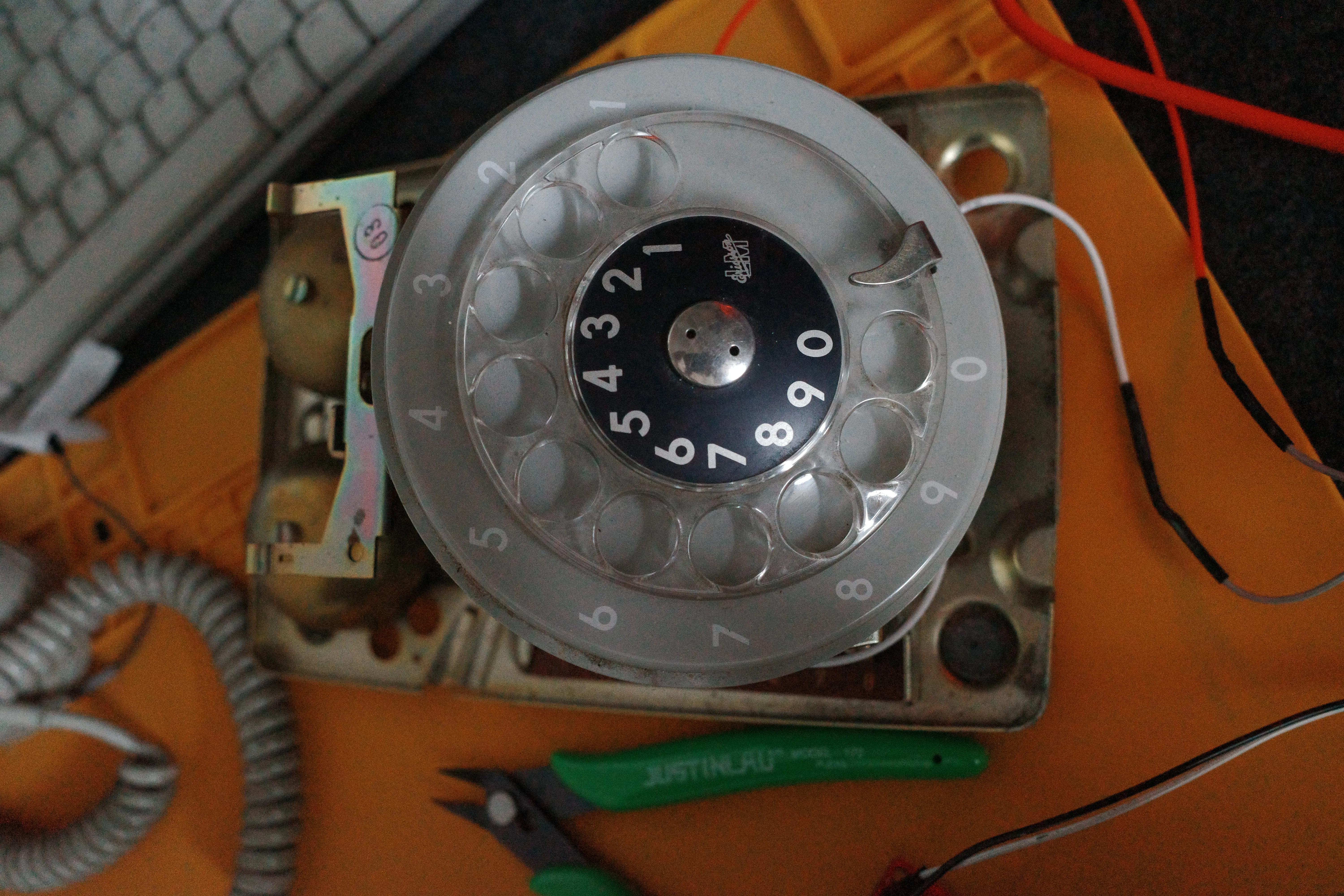 Top view of the telephone chassis with the dial and bells exposed