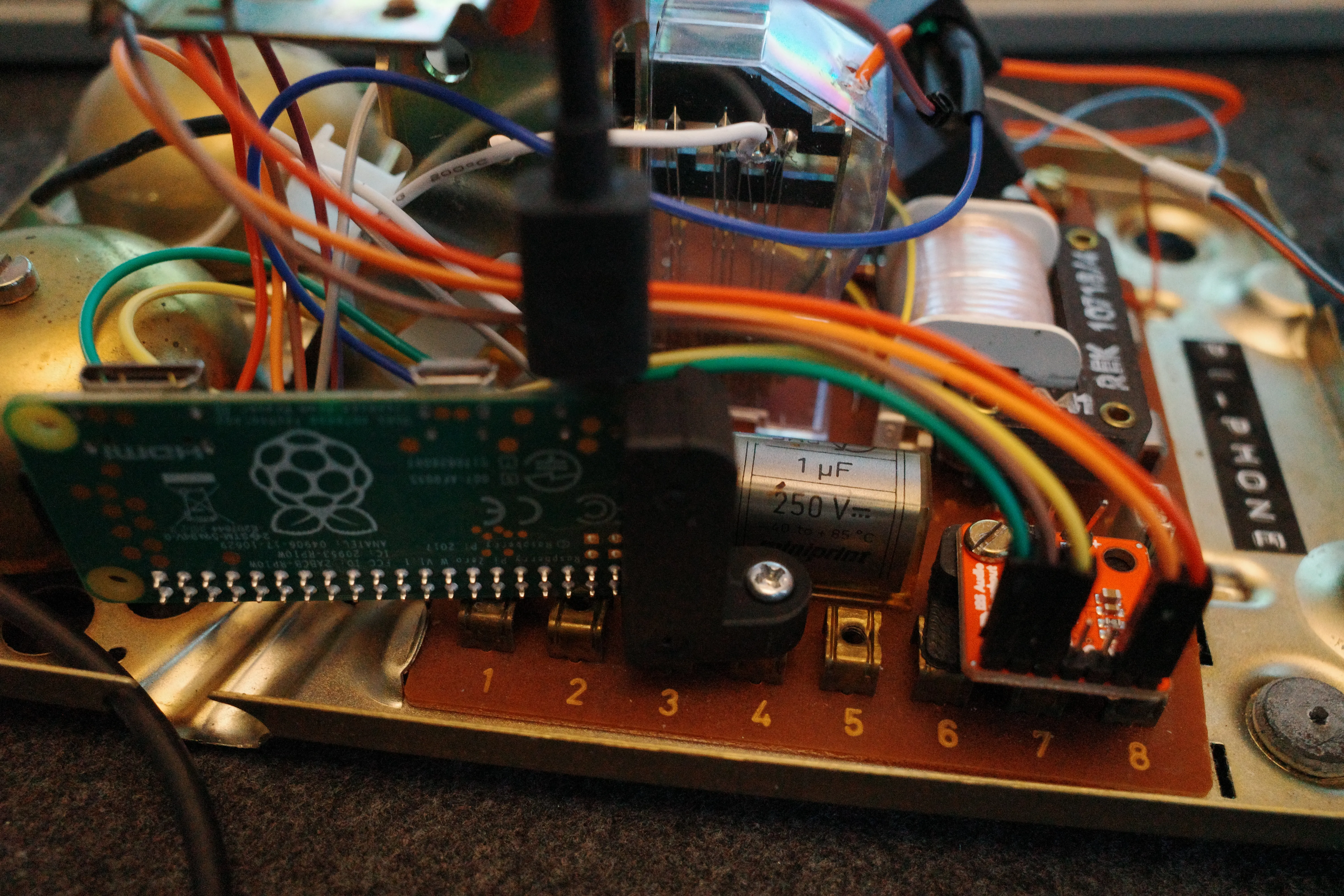 Close view of the installed Pi, GPIO wiring, amplifier, and printed mounts