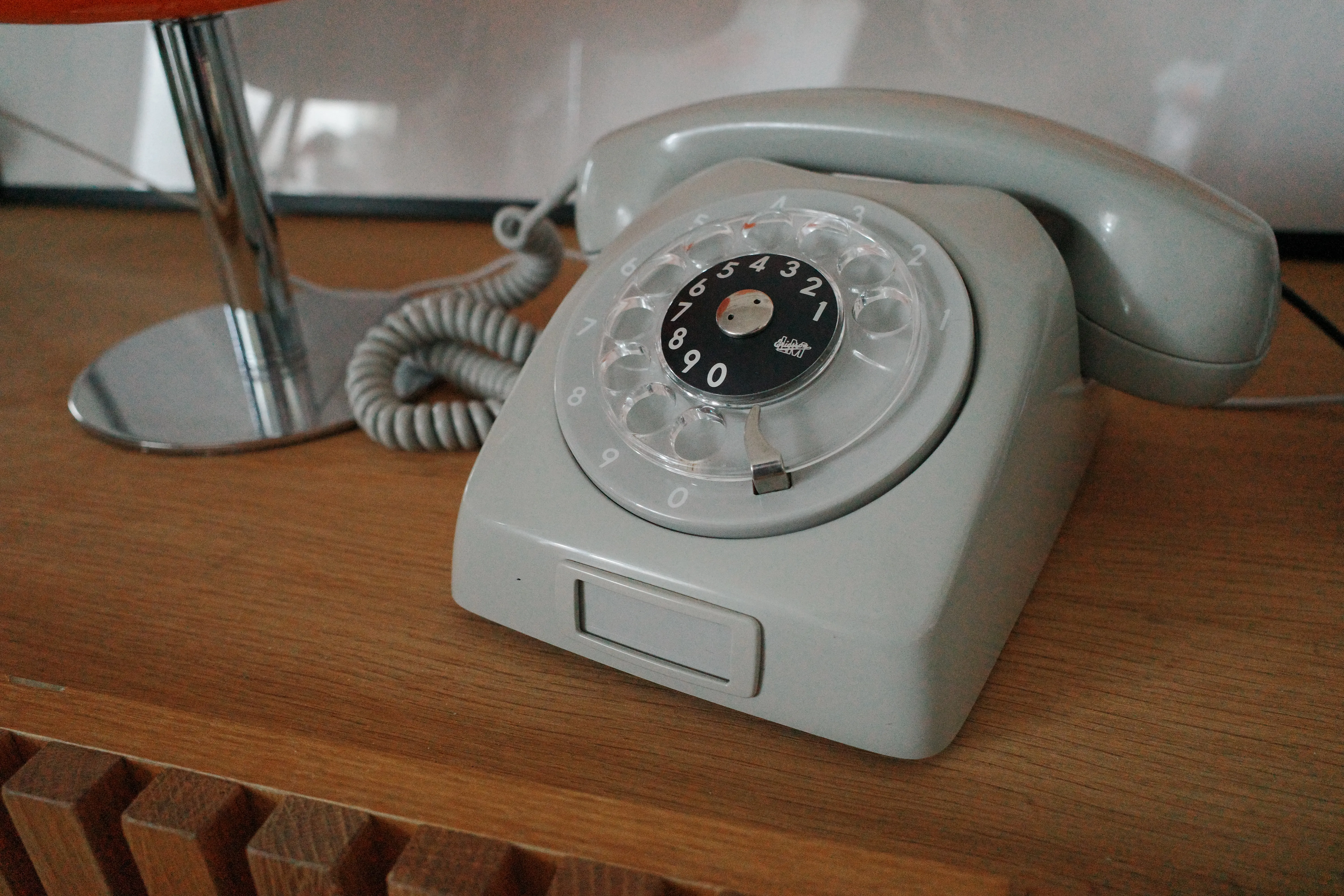 A restored grey rotary telephone containing a Raspberry Pi audio player.