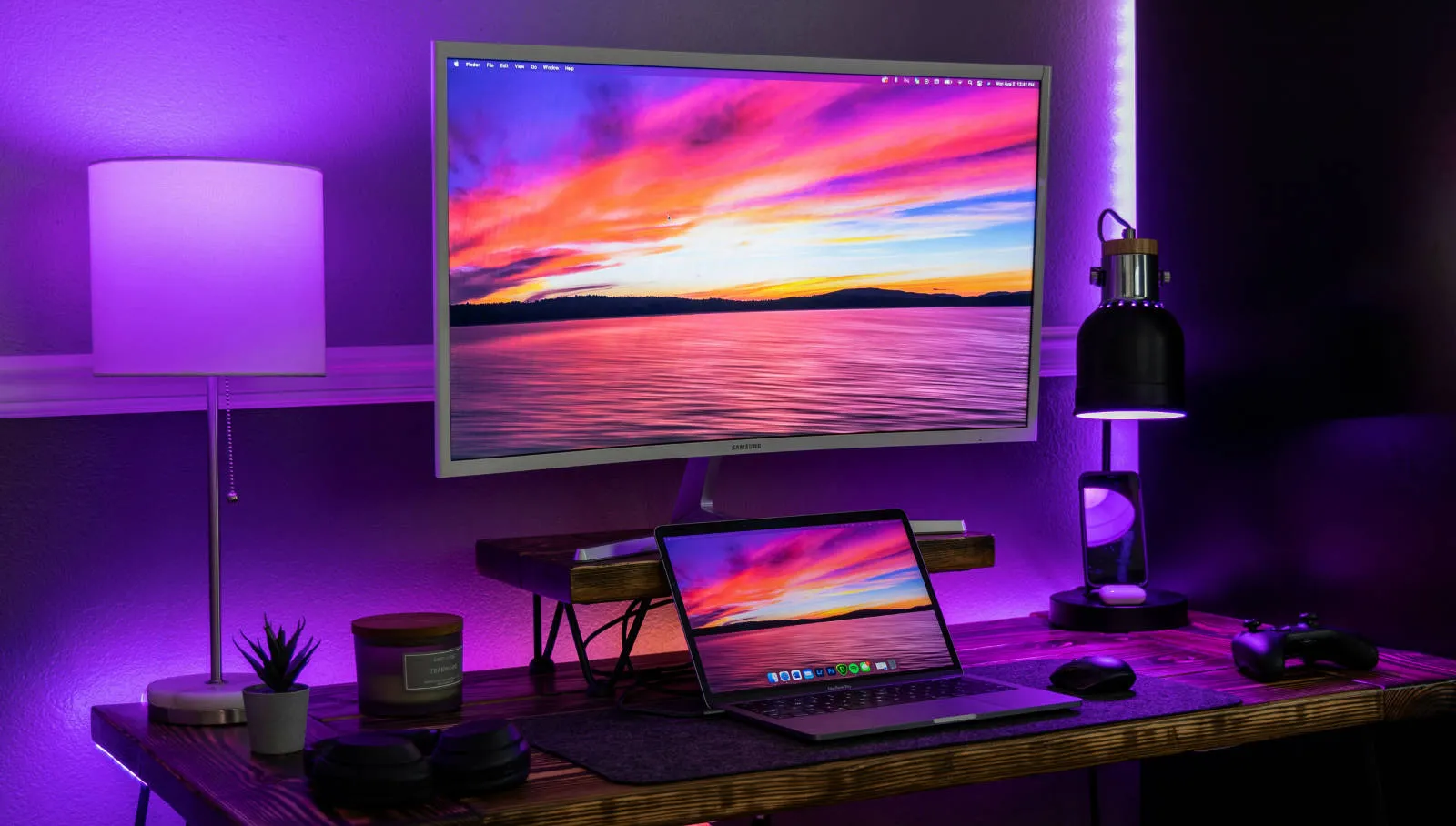 A desk setup with VS Code and a Philips Hue lamp flashing as a status indicator for Codex.
